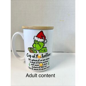 Grinch themed Cup of F**k offer mug with bamboo lid